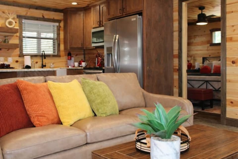 Comfort Cabin, 2 Bedrooms, Non Smoking, Pets Allowed | Living room | 50-inch Smart TV with digital channels, fireplace