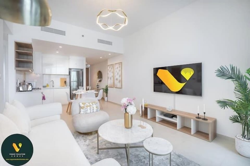 Luxury Apartment, Balcony, City View | Living area | 55-inch Smart TV with cable channels