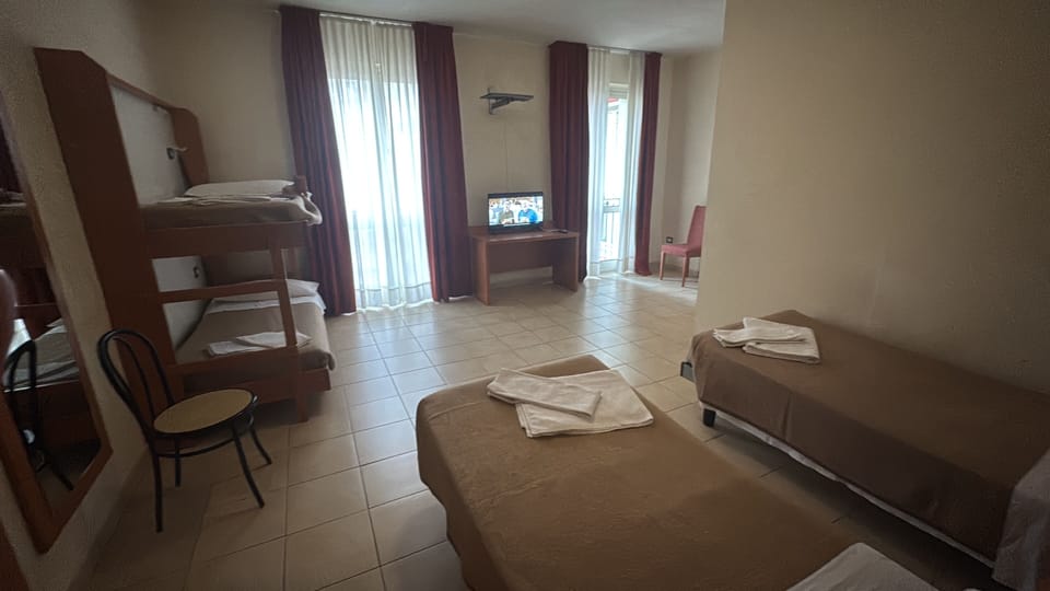 Comfort Quadruple Room | In-room safe, desk, iron/ironing board, free WiFi