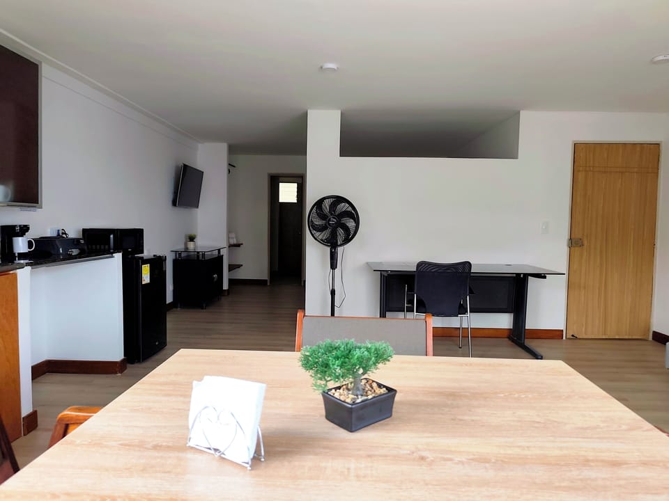 Basic Triple Room, Multiple Beds, Kitchenette | Dining