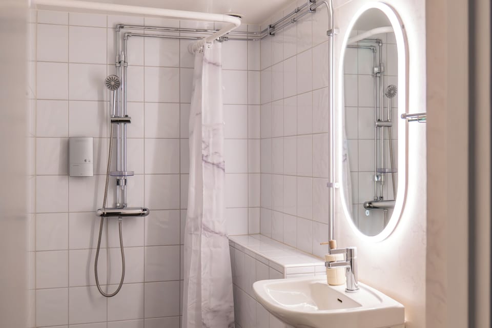 Shower, towels, soap, shampoo