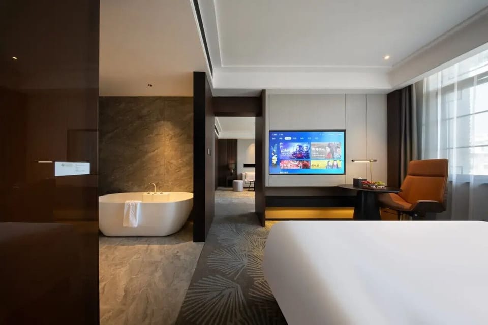 Morandi Suite | Desk, laptop workspace, blackout drapes, soundproofing
