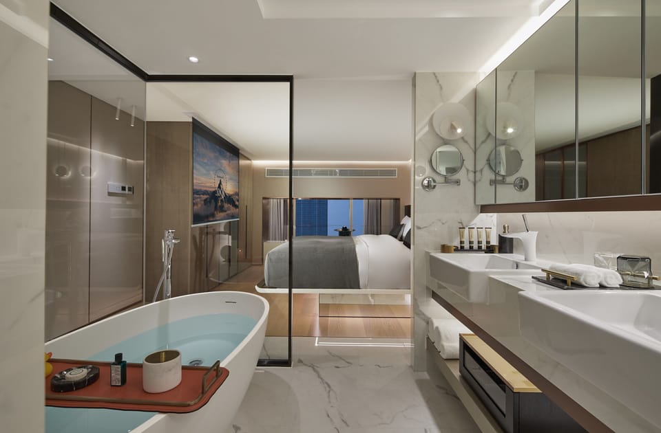 Wonderful Night Duplex Suite - 2 Twin Beds (2 Restrooms, Washer/Dryer, Taikoo Li View) | Bathroom | Free toiletries, hair dryer, bathrobes, slippers