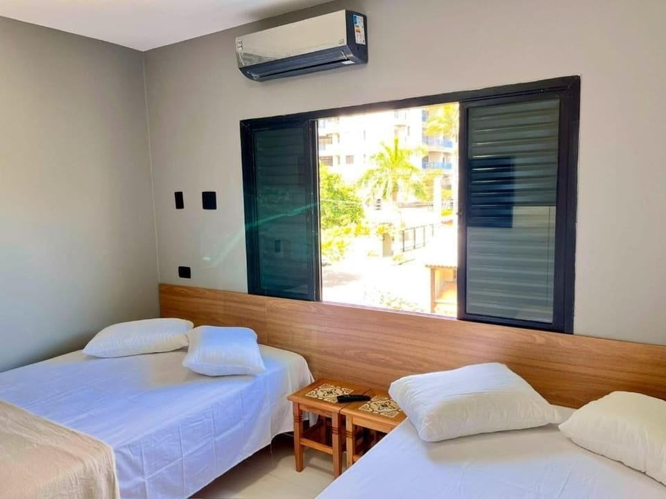 Deluxe Quadruple Room | Blackout drapes, iron/ironing board, free cribs/infant beds, free WiFi
