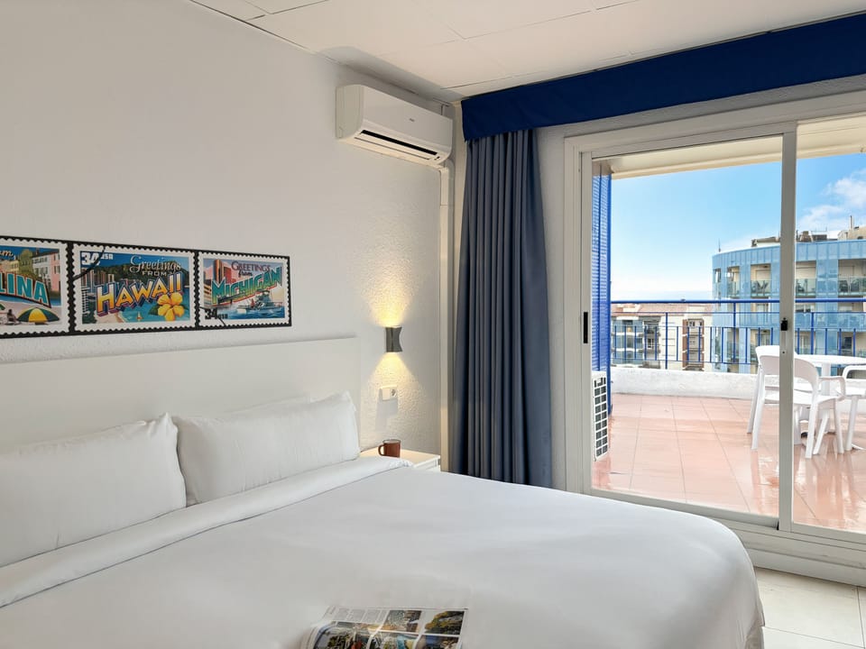 Superior Double Room, Sea View | In-room safe, blackout drapes, free WiFi, bed sheets