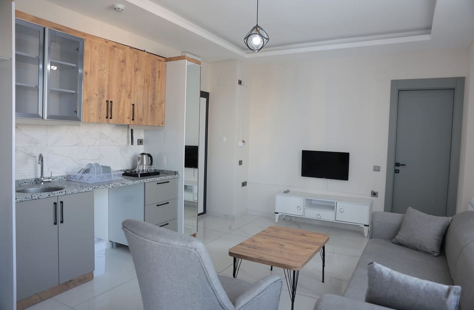 Luxury Suite, Balcony | Living area
