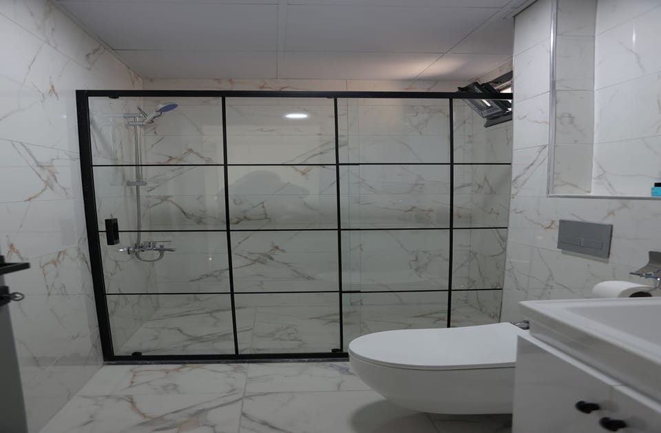 Suite, Balcony, Mountain View | Bathroom | Shower, hair dryer, towels, soap