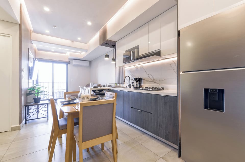Comfort Suite, Balcony, City View | Private kitchen | Full-size fridge, microwave, stovetop, blender
