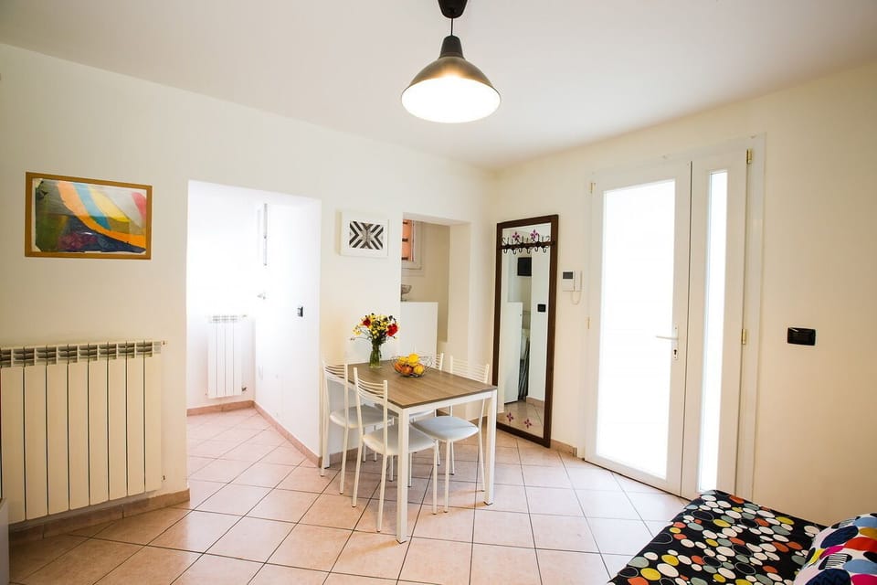 Apartment (SantOrsola apartment) | Living area | 42-inch flat-screen TV with cable channels
