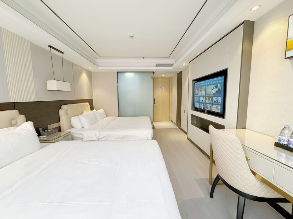 Family Twin Room, City View | Desk, laptop workspace, blackout drapes, free WiFi