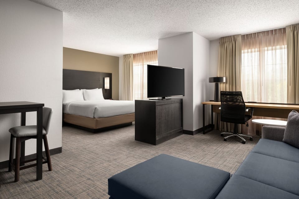 Premium bedding, pillowtop beds, desk, blackout drapes