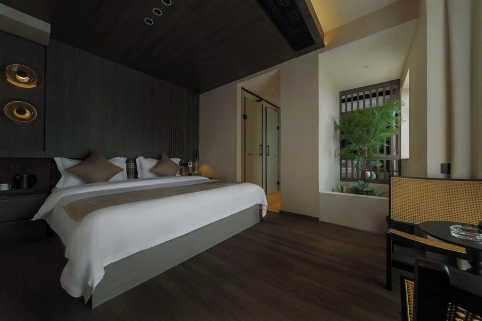 Luxury Suite, City View | Blackout drapes, soundproofing, WiFi (free), bed sheets