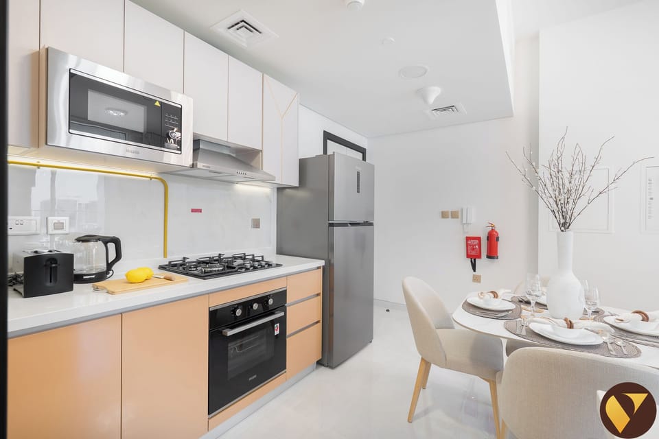 Standard Apartment, 1 King Bed with Sofa bed, Balcony, City View | Private kitchen | Electric kettle, highchair
