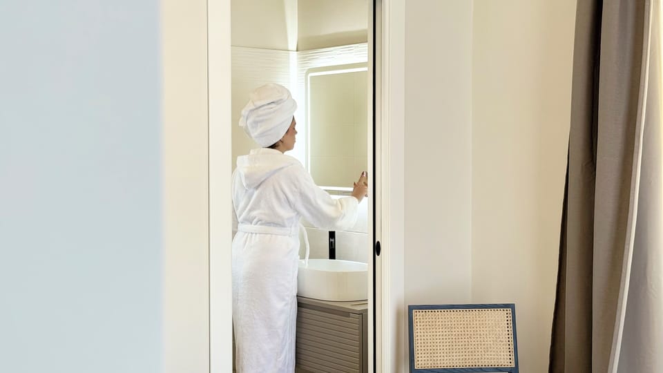 Luxury Studio Suite, City View | Bathroom | Free toiletries, hair dryer, slippers, towels