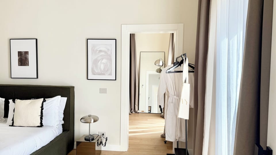 Luxury Studio Suite, 1 King Bed, City View | Down comforters, free minibar, individually decorated