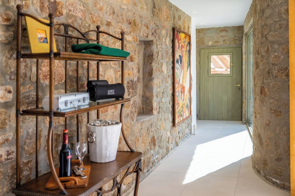 Superior Villa, Sea View | Living area | 55-inch Smart TV with satellite channels