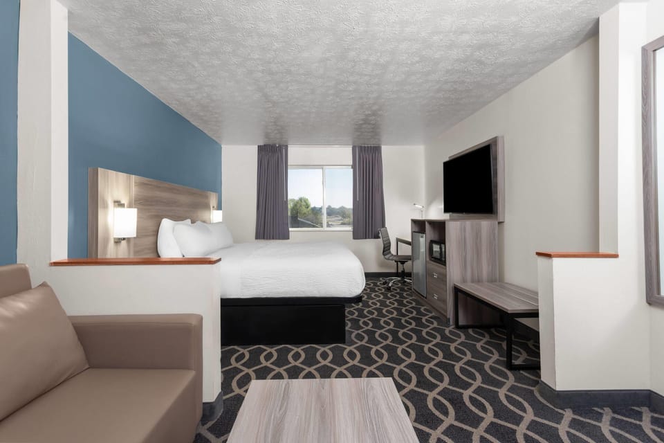 Studio Suite, 1 King Bed, Accessible, Non Smoking (Mobility) | Desk, laptop workspace, iron/ironing board, free cribs/infant beds