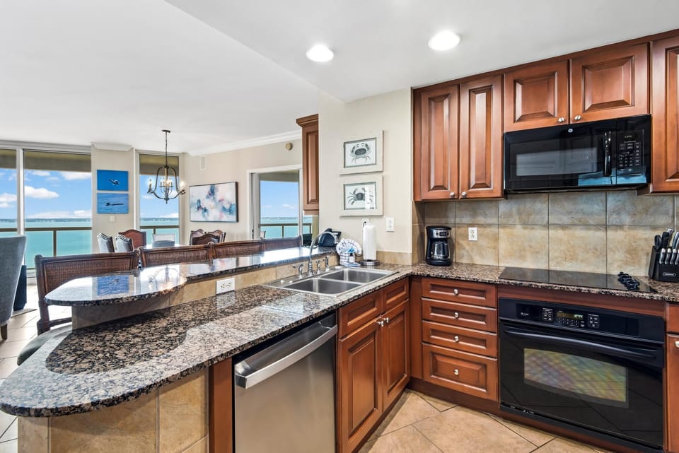 Condo, Multiple Beds (Portofino Island Resort 4-1101) | Private kitchen | Oven, toaster