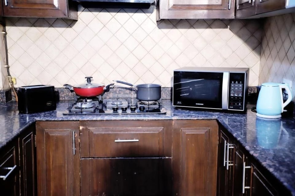 Premium Apartment, Balcony, City View | Private kitchen | Dining tables