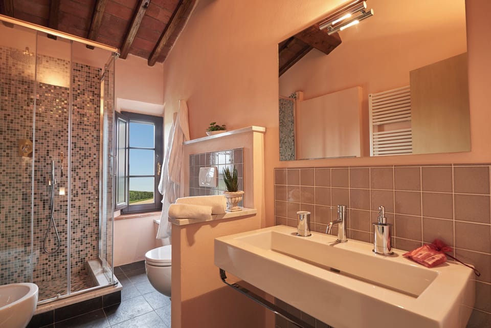 Junior Suite, 1 Bedroom, Garden View | Bathroom | Free toiletries, hair dryer, slippers, towels