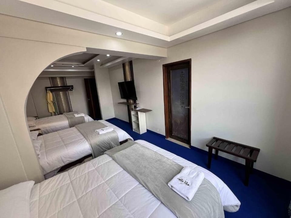 Down comforters, blackout drapes, iron/ironing board, free WiFi