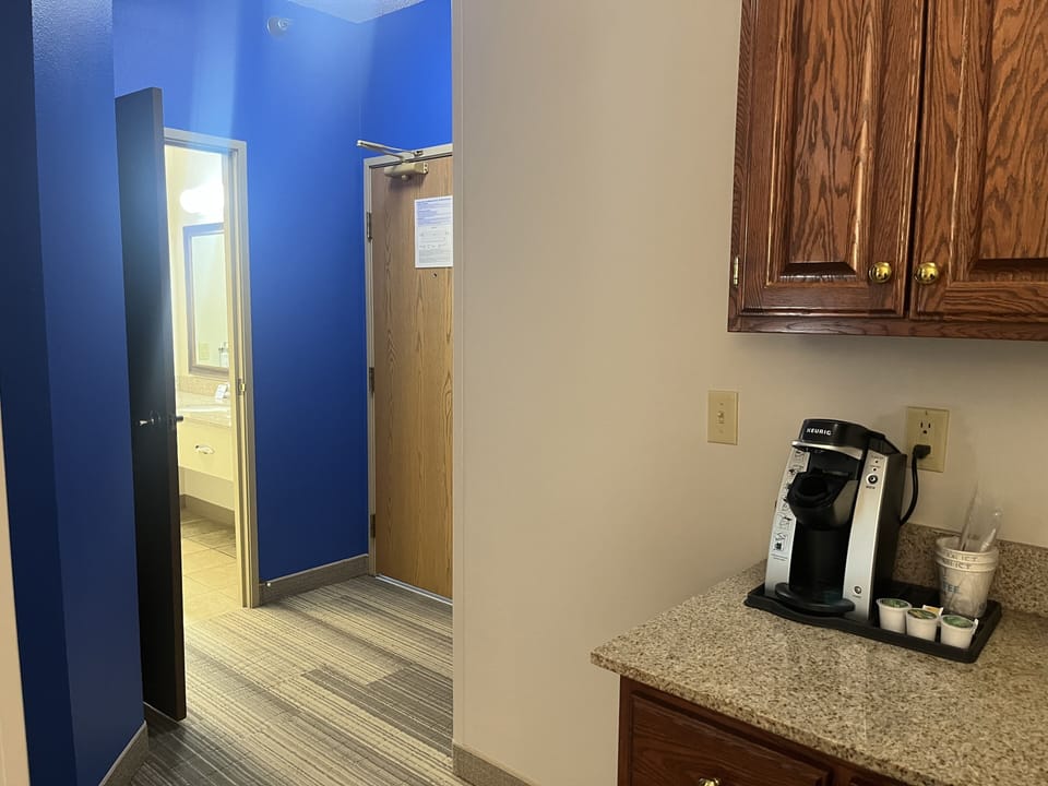 Suite, 1 King Bed with Sofa bed (Dining) | Desk, blackout drapes, iron/ironing board, free WiFi