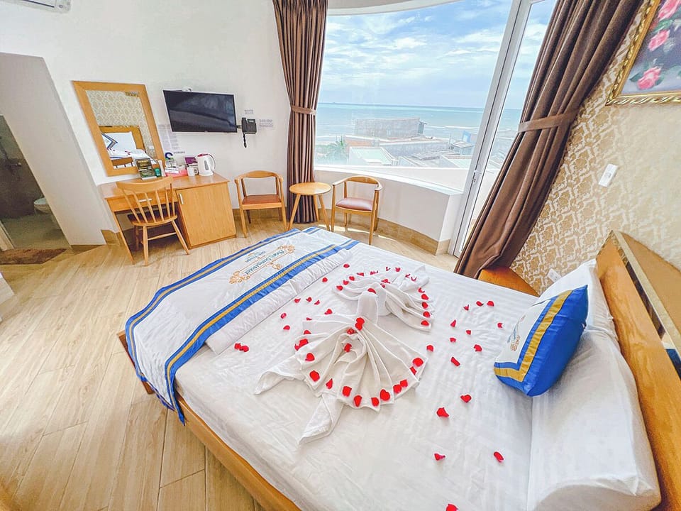 Premium Double Room, 1 King Bed, Beach View, Sea Facing | Minibar, desk, laptop workspace, blackout drapes