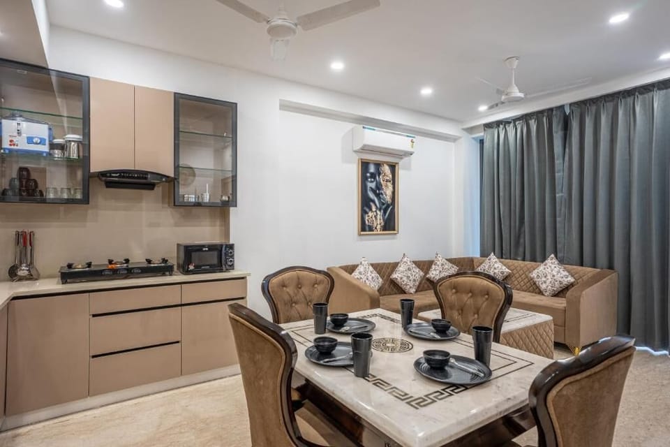 Apartment, Balcony, Garden View | Living area | 44-inch Smart TV with digital channels