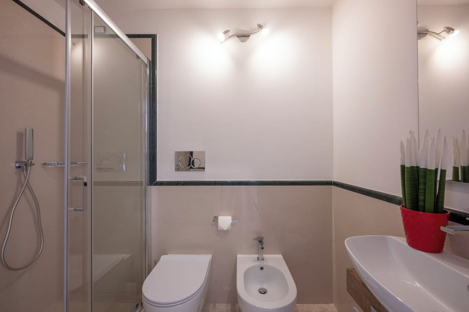 Classic Double Room, Balcony, City View | Bathroom | Hair dryer, towels, soap, shampoo