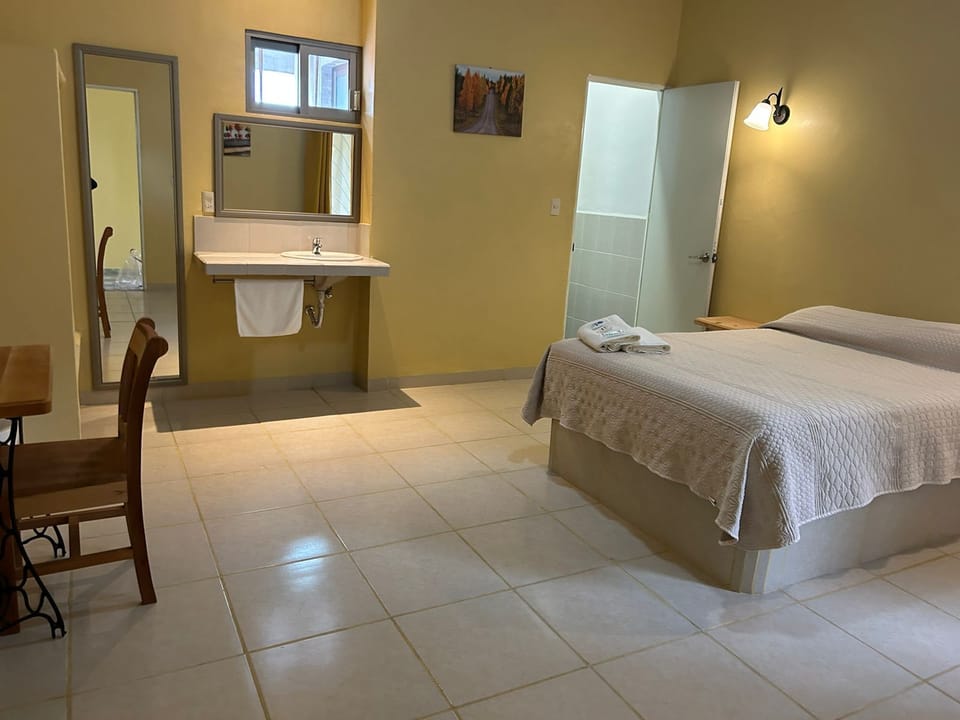 Standard Double Room | Down comforters, desk, laptop workspace, iron/ironing board