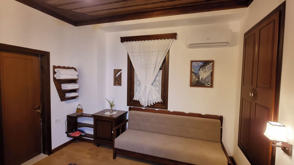 Deluxe Double Room | Living area | TV