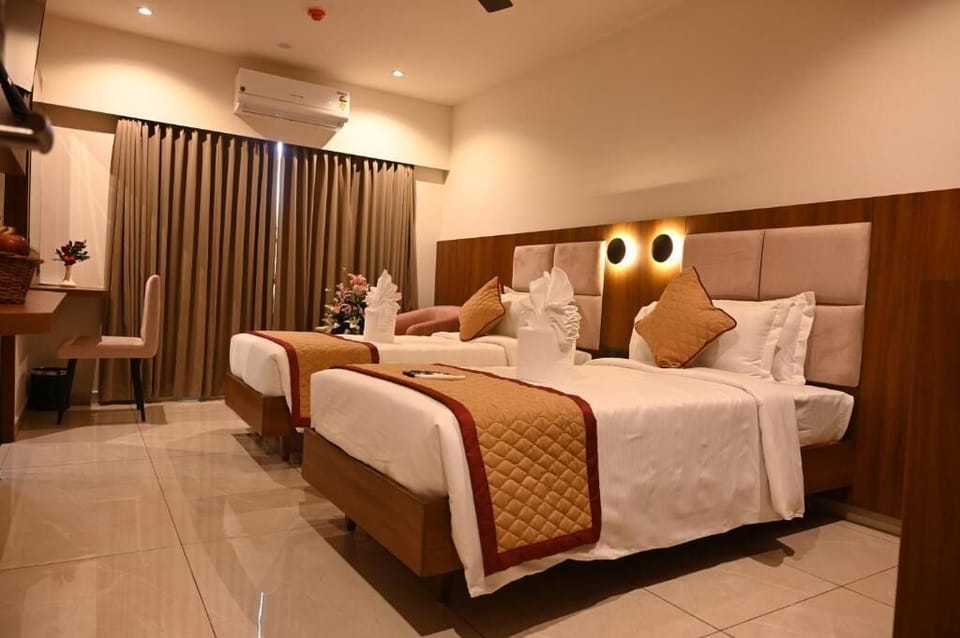 Double or Twin Room, City View | In-room safe, soundproofing, free WiFi, bed sheets