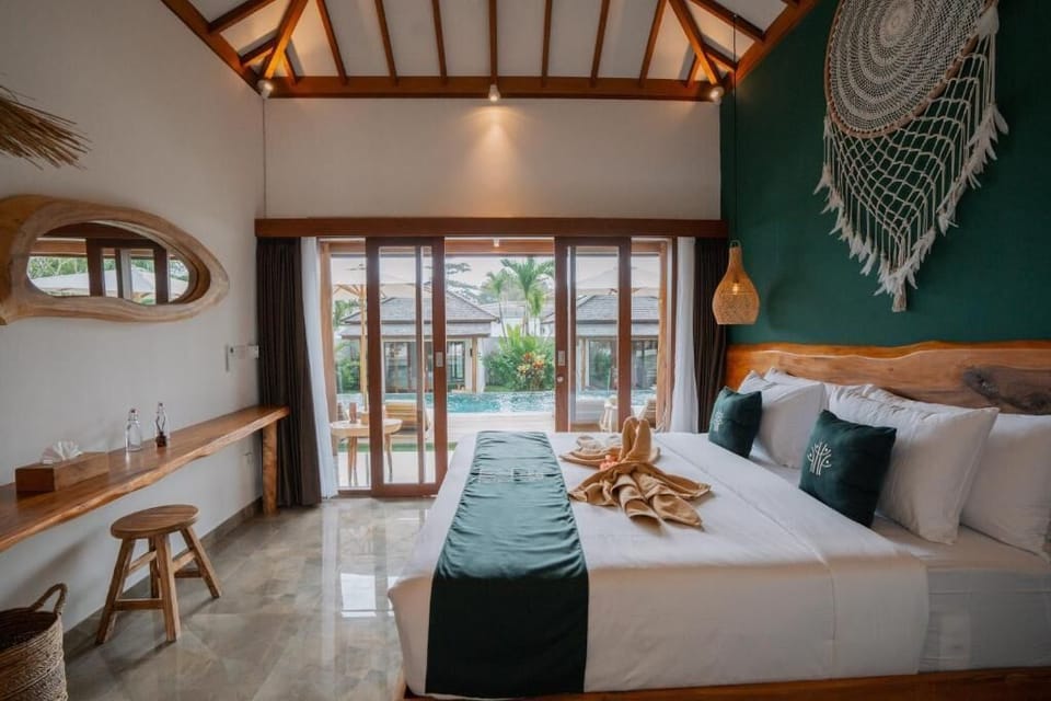 Deluxe Bungalow, Pool View | In-room safe, blackout drapes, iron/ironing board, free WiFi