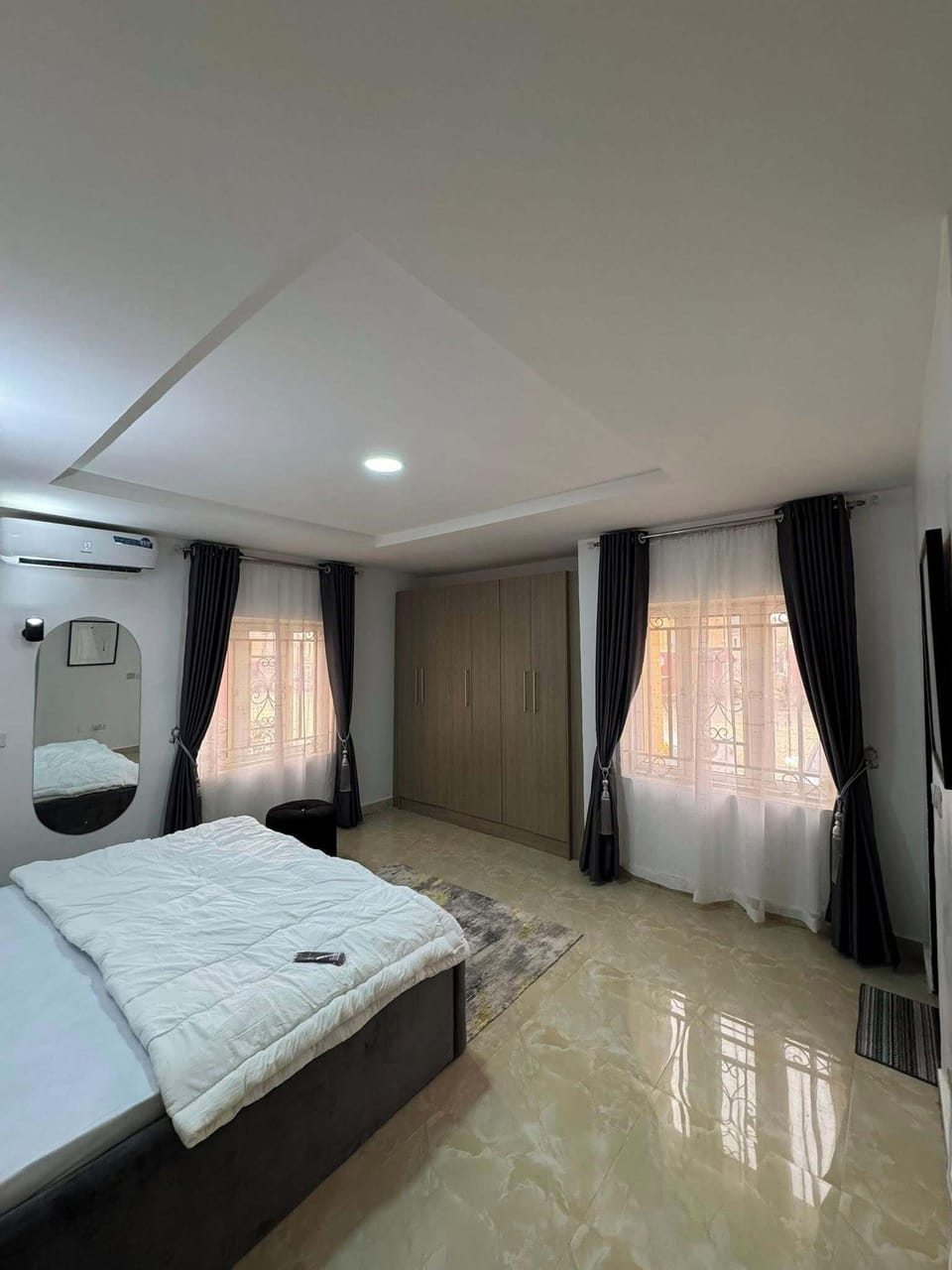 Economy Room, Balcony, City View | Desk, laptop workspace, blackout drapes, soundproofing