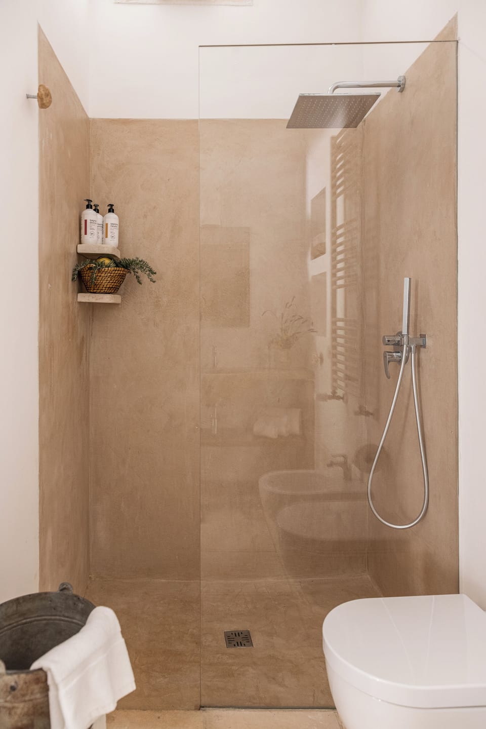 Shower, hair dryer, slippers, towels