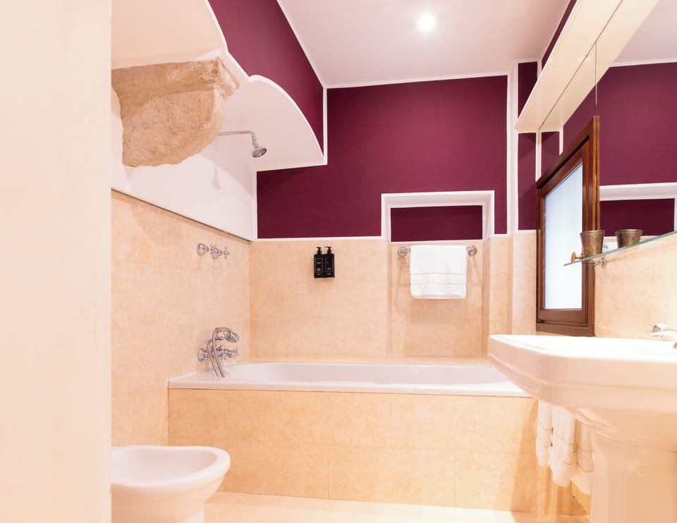Superior Suite, Lagoon View | Bathroom | Shower, hair dryer, slippers, towels