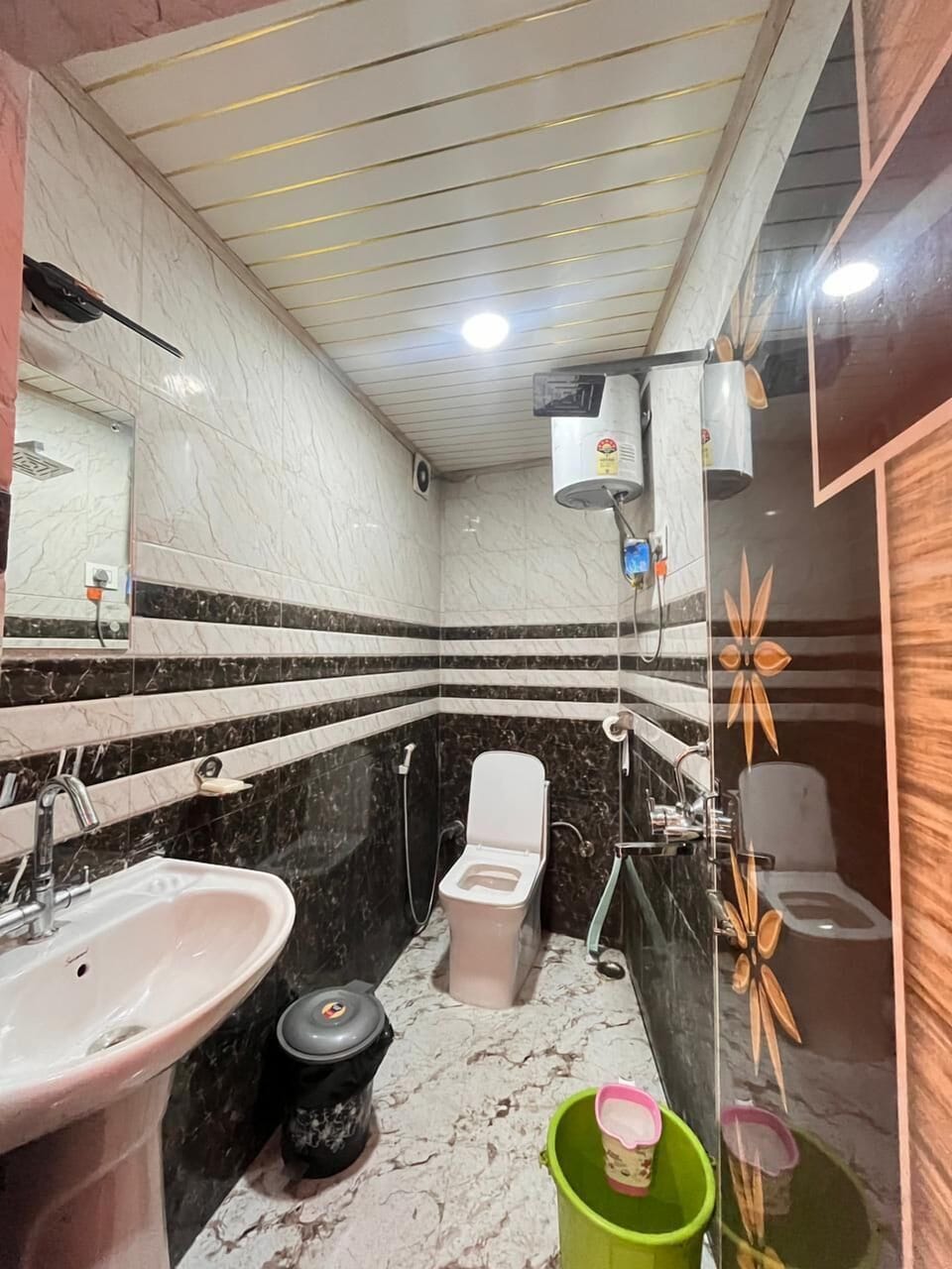 Shower, free toiletries, slippers, towels