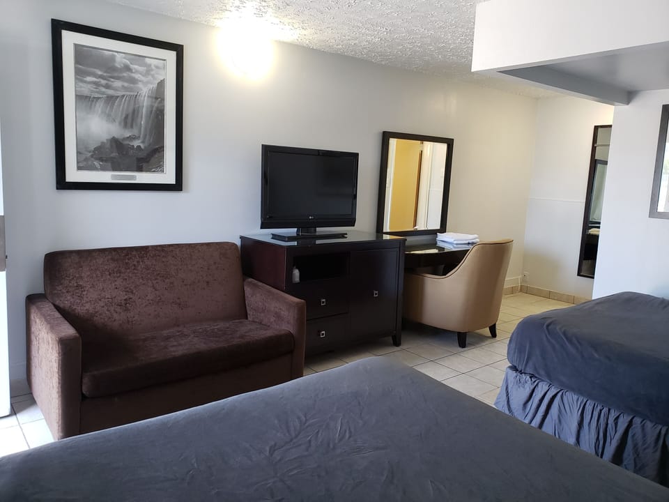 Standard Room, 2 Queen Beds | Desk, blackout drapes, free WiFi, bed sheets