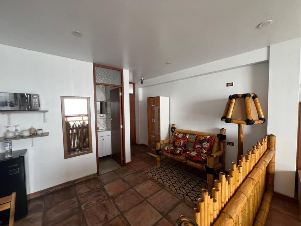 Premium Suite, Ocean View | Minibar, WiFi (free), bed sheets