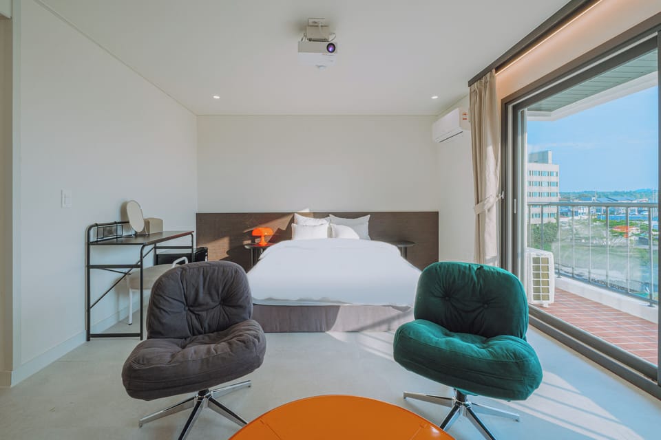 Deluxe Double Room, Balcony, City View | Desk, free WiFi