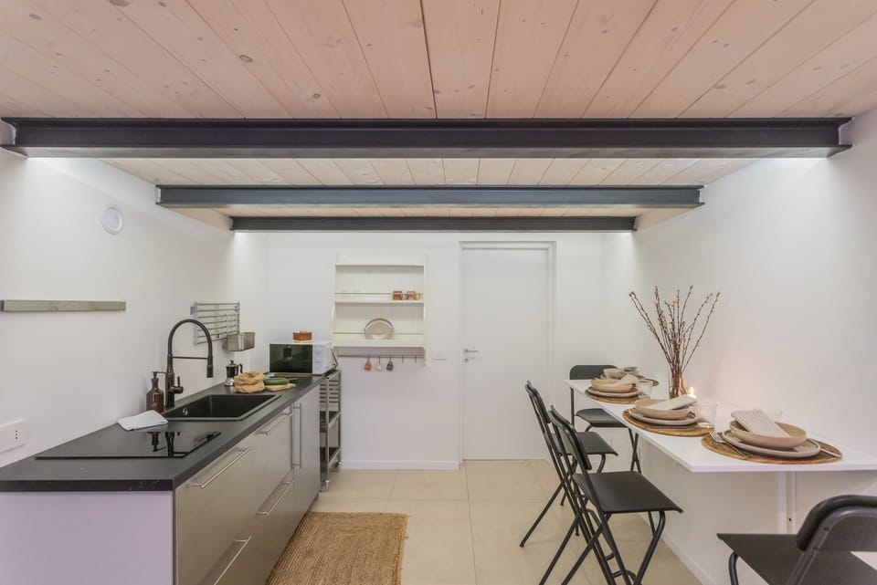 Apartment (1 Bedroom) | Private kitchen | Microwave, espresso maker, highchair