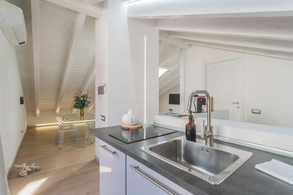 Apartment (1 Bedroom) | Private kitchen | Microwave, espresso maker, electric kettle, highchair