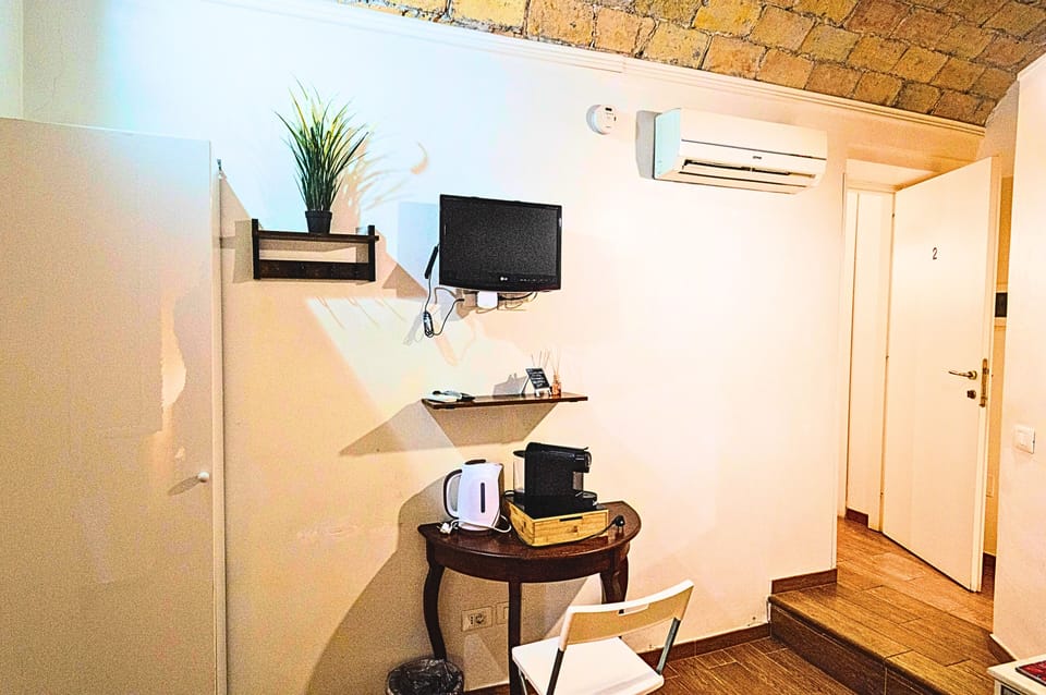 Classic Double or Twin Room | Desk, laptop workspace, blackout drapes, iron/ironing board