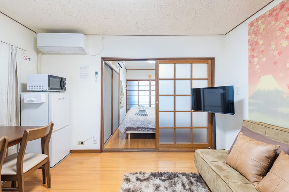 Comfort Apartment | Living area | 30-inch TV with cable channels