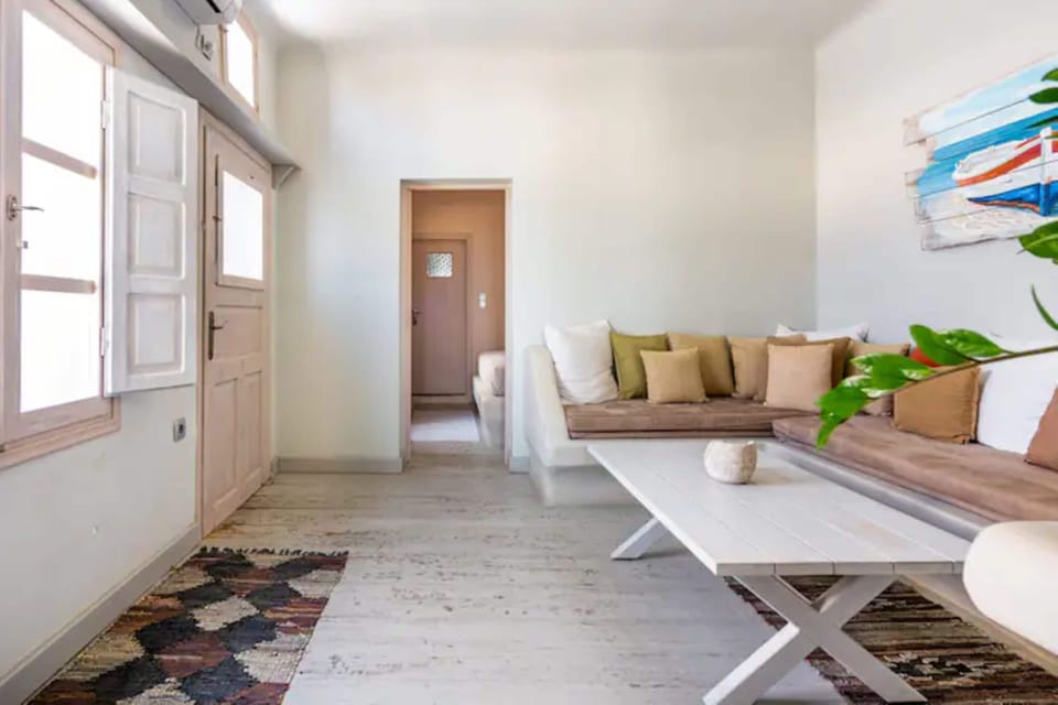 Deluxe Villa, 1 Bedroom, Jetted Tub, Sea View | Living area | 35-inch LCD TV with digital channels