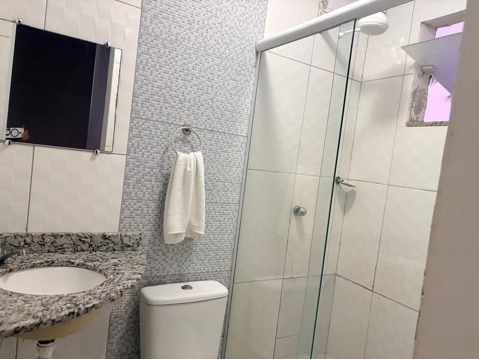 Shower, towels, soap, toilet paper