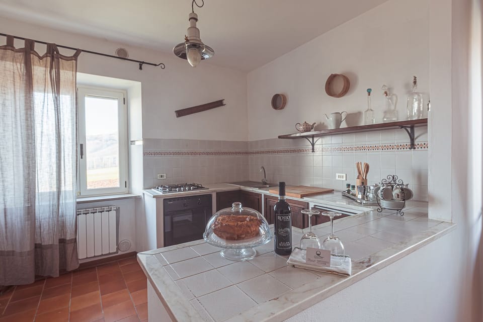 Apartment, 2 Bedrooms, Non Smoking (ALLORO) | Private kitchen | Full-size fridge, stovetop, cookware/dishes/utensils, dining tables