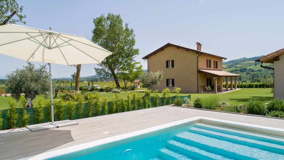 Seasonal outdoor pool, pool umbrellas