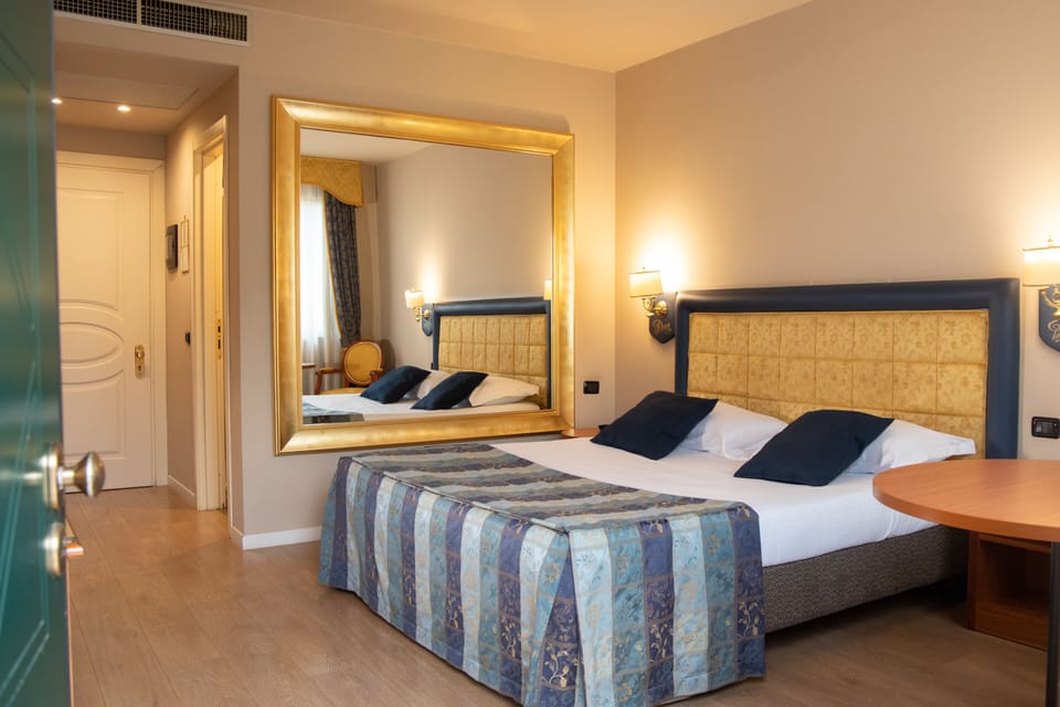 Premium bedding, desk, blackout drapes, soundproofing