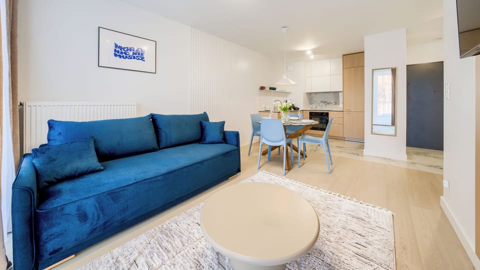 Apartment (114) | Living area | 30-inch flat-screen TV with cable channels